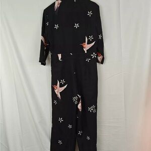 Valentino Black Garment with Floral Accents